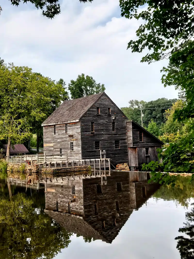 A picutre of the historic Yates Water Mill museum located at Historic Yates Mill County Park in Raleigh, NC.